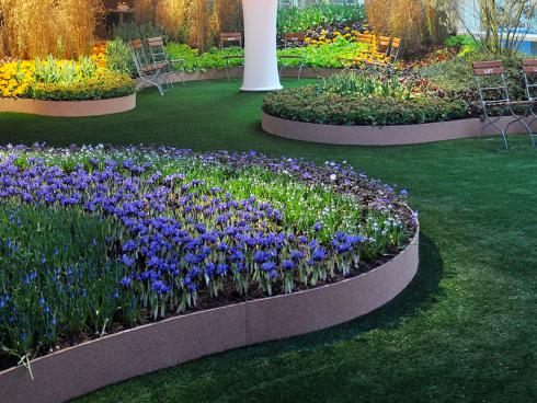 Bild: garten.ch moderne Gartenromantik five elements Bepflanzung mit Iris